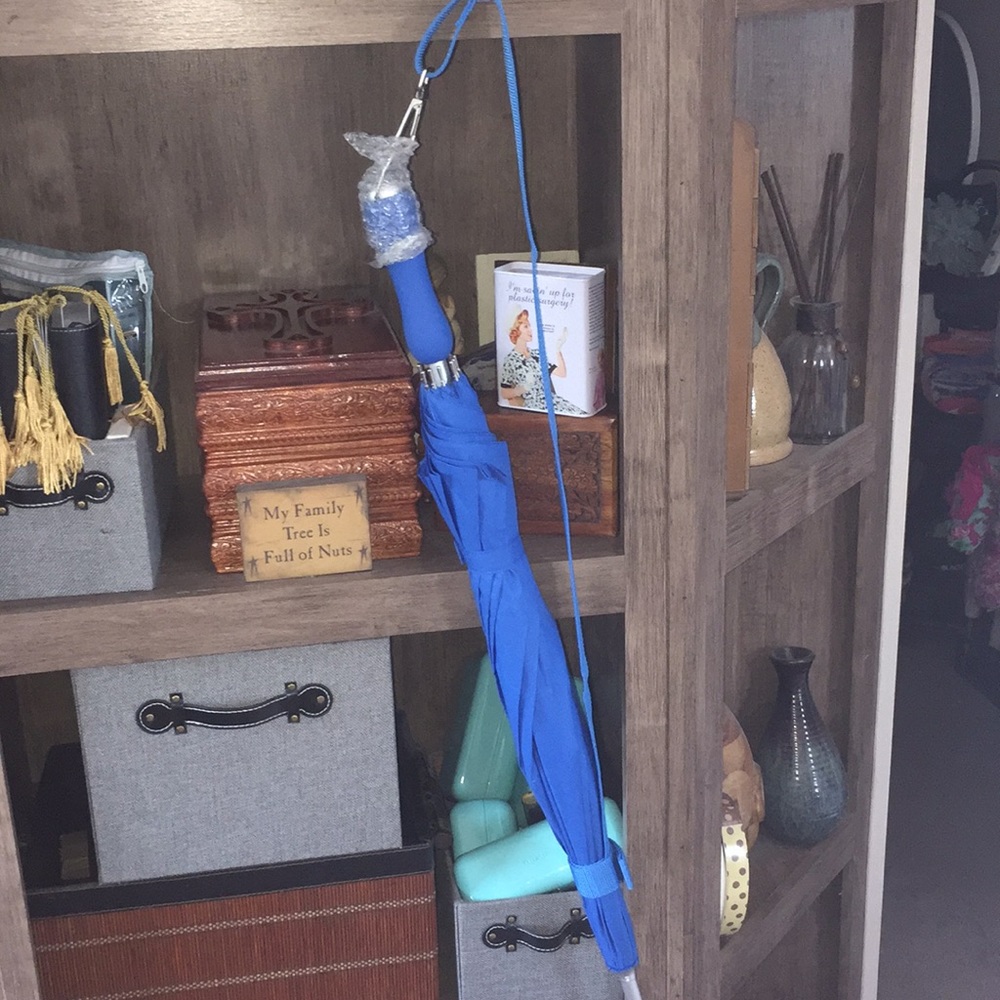 2 umbrellas with built in carry shoulder straps!